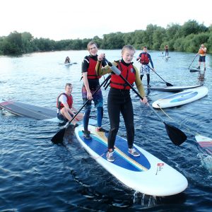 adult paddle boarding sessions party group doing outdoor activities cheshunt hertfordshire